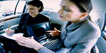 woman in limo workng